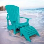 C01 Classic Adirondack Chair with Footstool in Turquoise HDPE recycled plastic on a beach